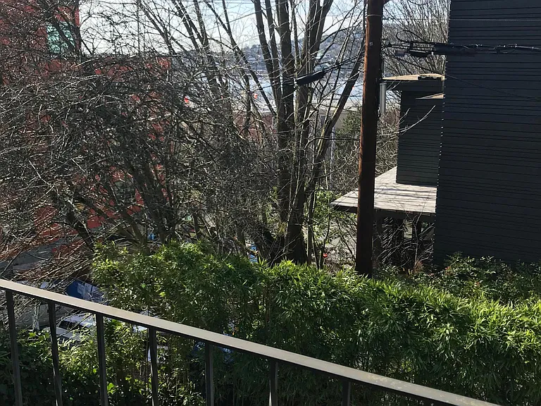 Partial view of Lake Union and Space Needle from living room balcony