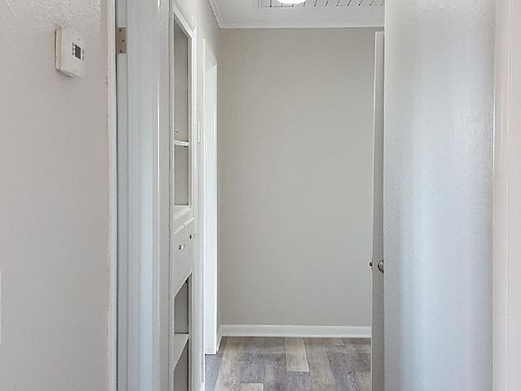 Hall with storage cabinets and drawers