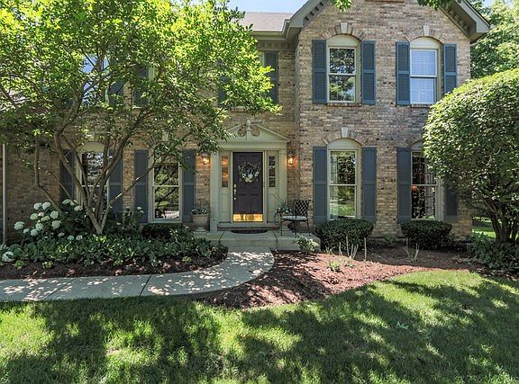 Brick Front Custom Built Georgian with Newer Roof and Driveway. Curb appeal with beautifully upgraded landscape with newer custom brick paver patio.  Freshly painted inside and upgrades everywhere!~