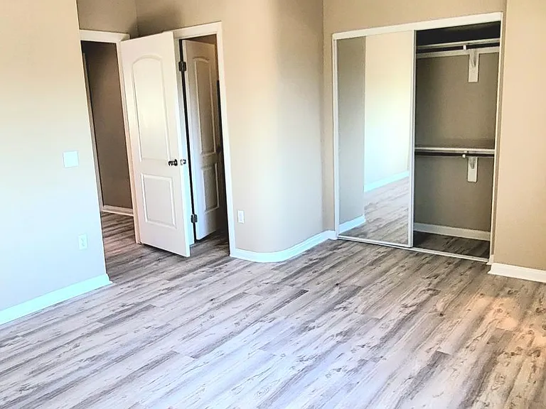 Master bedroom facing closets