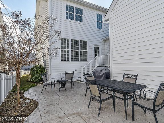 trex deck and stamped concrete patio