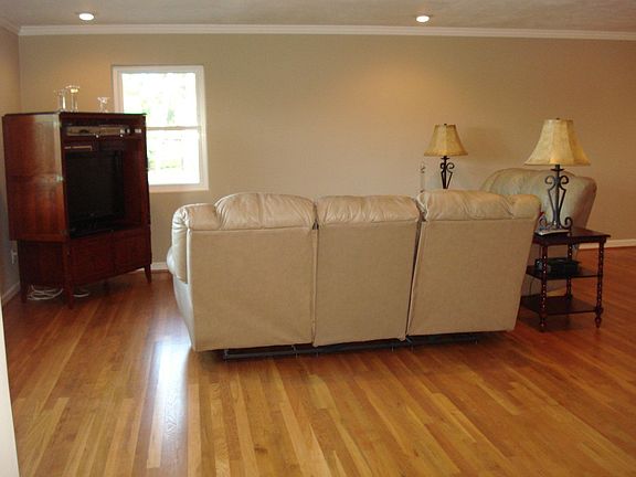 View from foyer into front half of living / family room