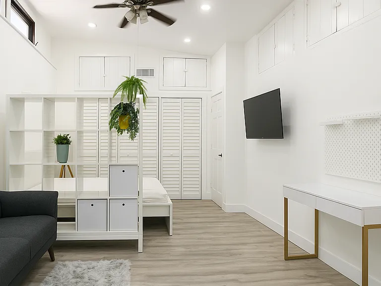 Extra-high ceilings with ceiling fan and personal AC unit for added comfort!