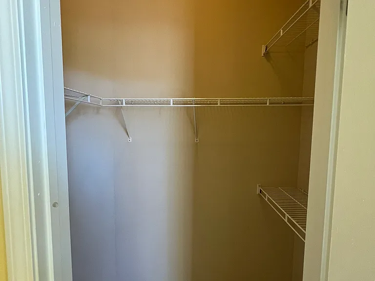 Walk-in closet in bedroom