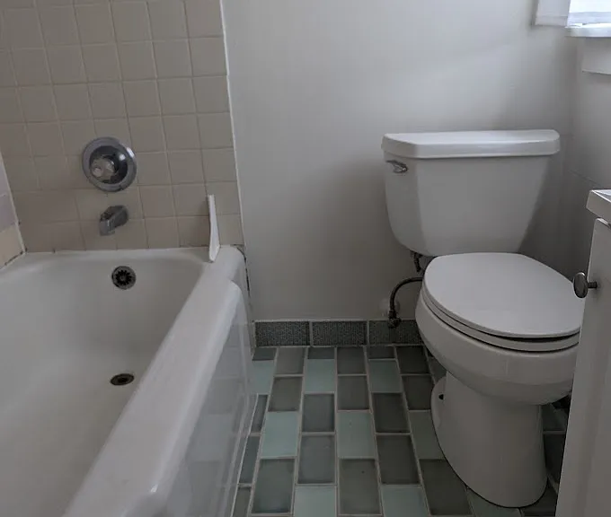 Restored bathroom with Pratt and Larson tile.