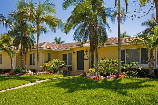 Tropical setting across street from Intracoastal Waterway