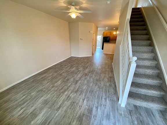 Living Rm, Dining Rm (behind stairs) and Kitchen