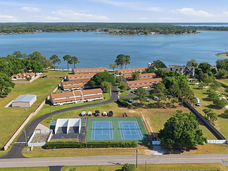 Overview of the tennis courts, racquetball courts, condos and the lake