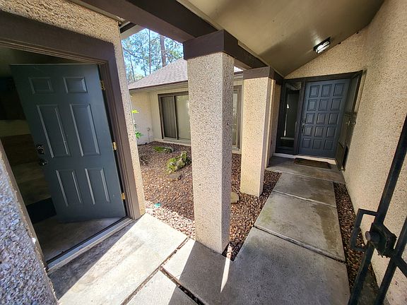 Courtyard, garage and foyer entry