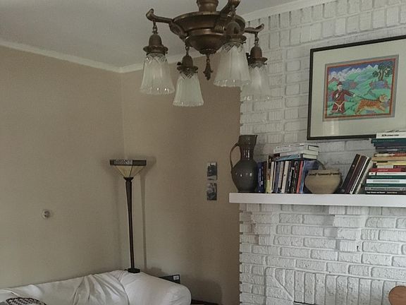 Large Living Room featuring original (nonfunctional) fireplace