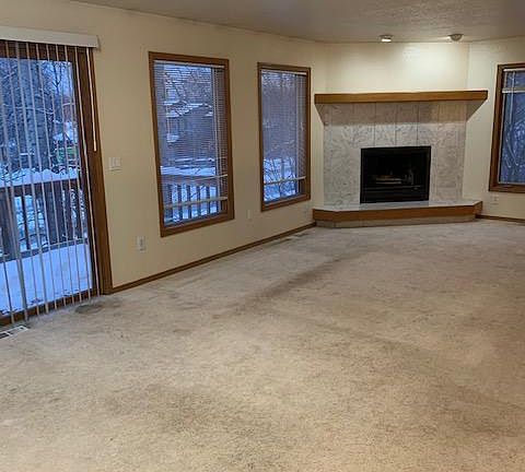 Living room with wood fireplace