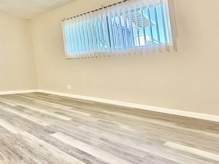 Bright & airy bedroom with new thermal windows.