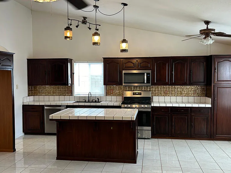 Kitchen with Central island open to great family room and breakfast knok