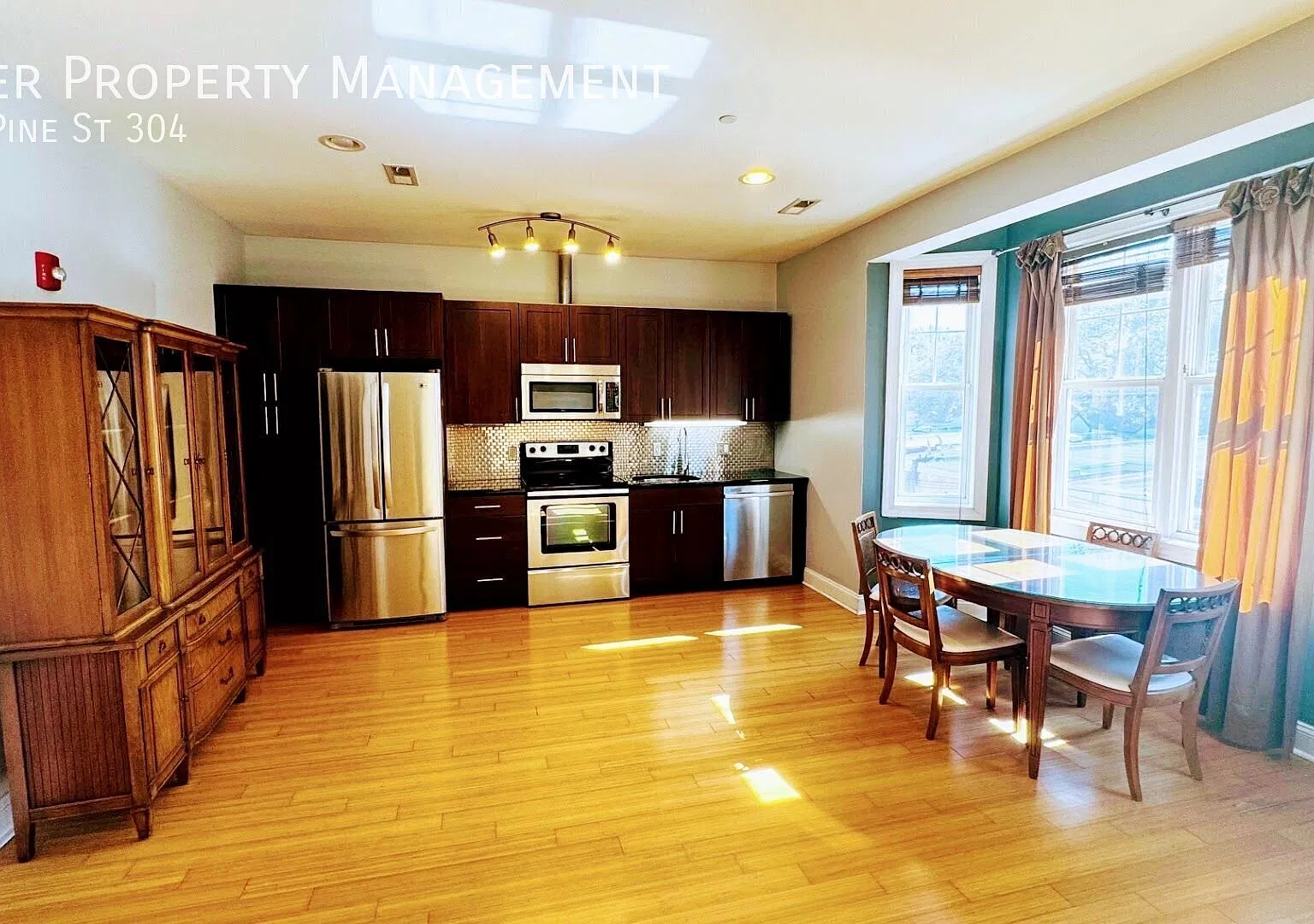 Modern 1BR/1BA Condo with Garage Parking, Central A/C & In-Unit Laundry — Photo 4