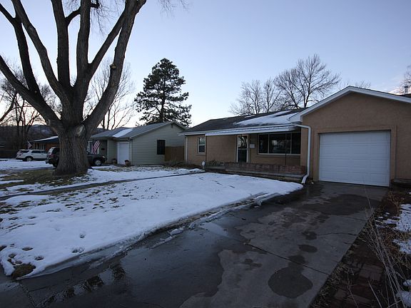 Enjoy the mature trees in large front yard