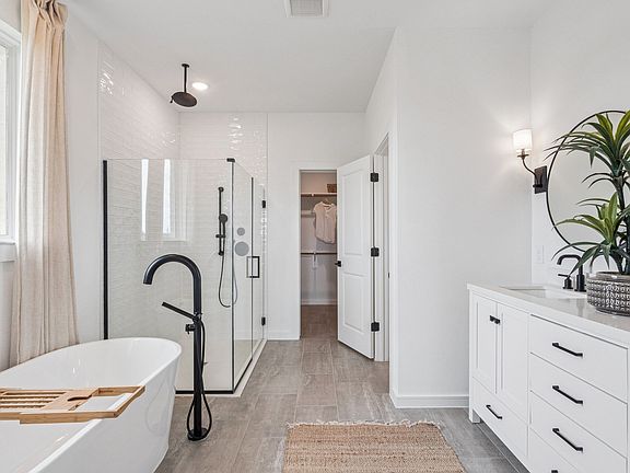 Primary bath with glass shower enclosure