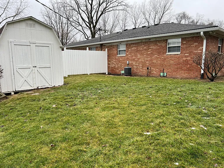 Backyard with shed for you to use.