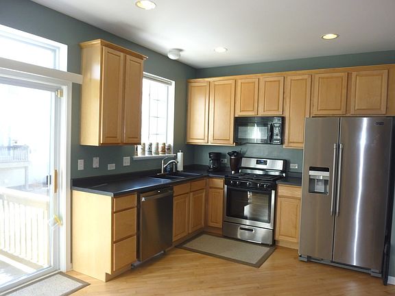 42" Maple Cabinets, Refrigerator 1 year, upgraded sink, recessed lighting