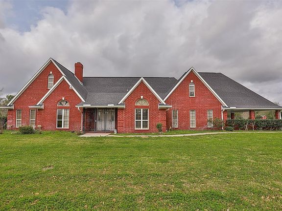 Sitting back from the street this Striking Red Brick One Story with an attractive elevation features an Open floor Plan and great flexible space and has been just recently updated. It looks and feels fresh and the neutral colors will lend themselves 