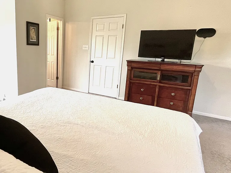 Enjoy your favorite streaming series. Master Bedroom features LED TV equipped with antenna for live TV and Roku for streaming