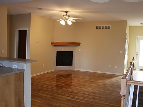 Living Room with a remote control fire place