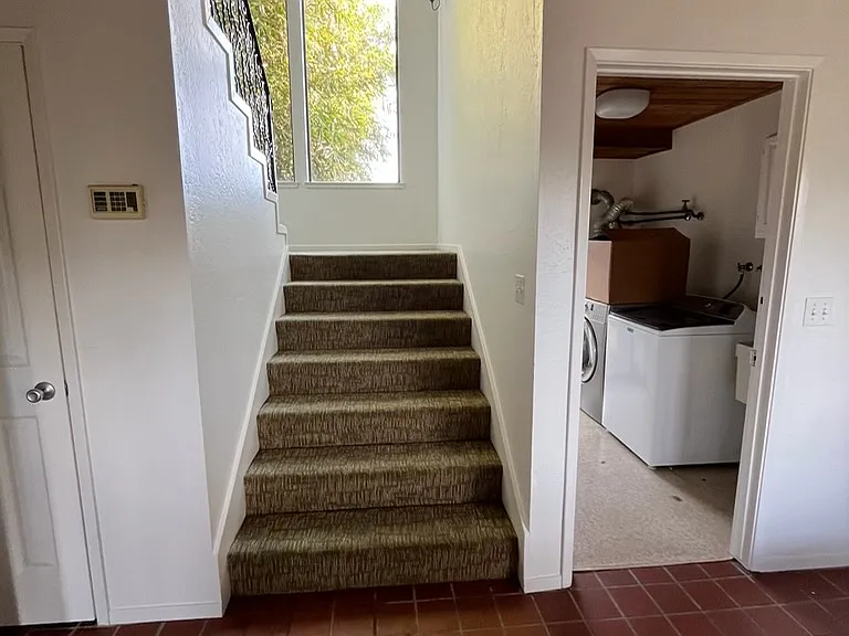 Entryway, caot closet and laundry room downstairs