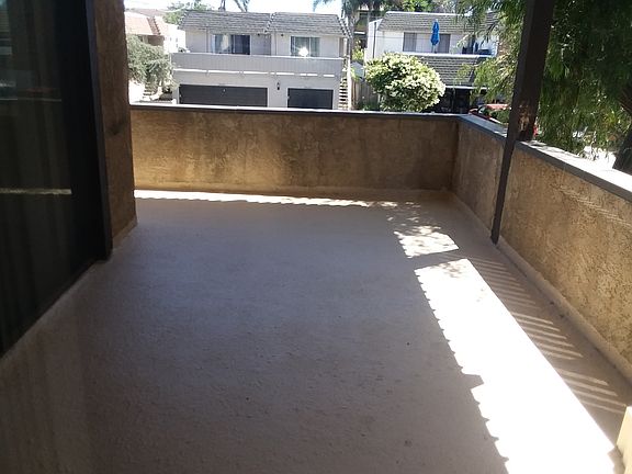 large cover patio and sunny balcony