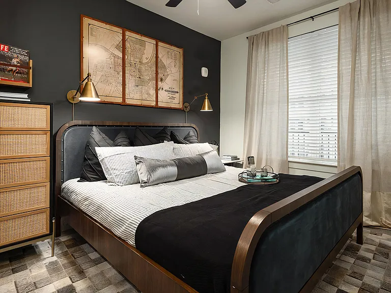 Modern Bedroom with Velvet Upholstered Bed and Ambient Lighting
