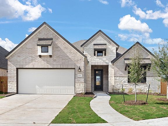 Welcome home to 2010 Emma Howse Lane in StoneCreek Estates and zoned to Lamar Consolidated ISD.