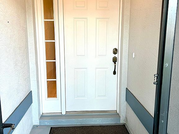 Screen porch at front entry door