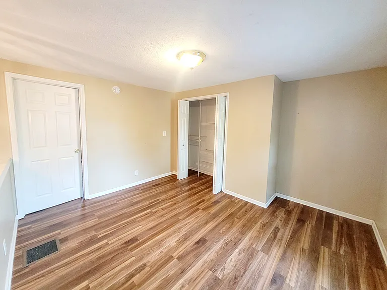 Upper level sitting room/office with access to the bedroom