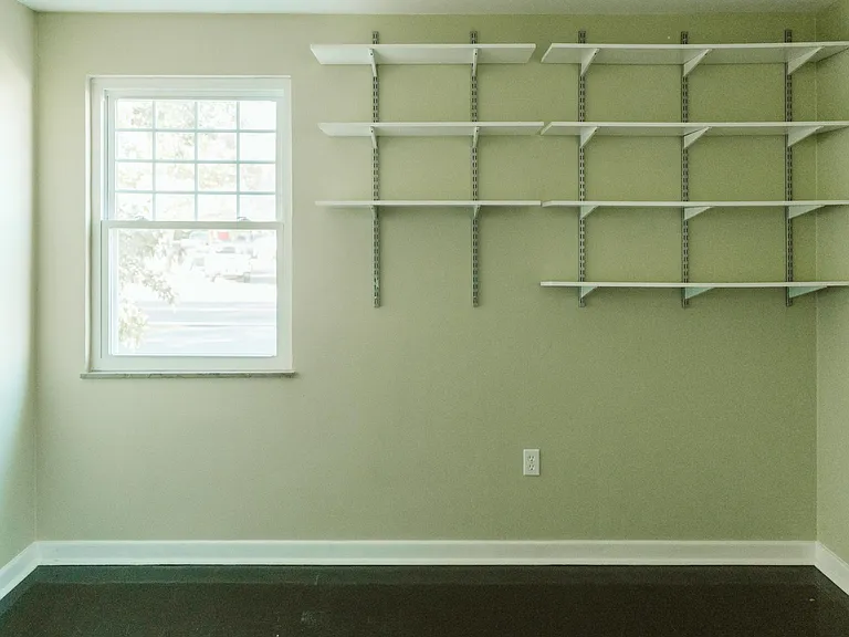 Bedroom 2 with two windows and large closet