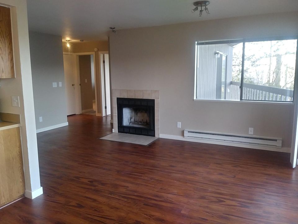 Living room looking out to bedroom balcony.