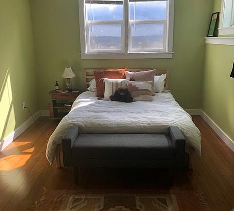 This is taken from the door to the laundry room. The bedroom has no closet as the washer and dryer are in what was the closet.