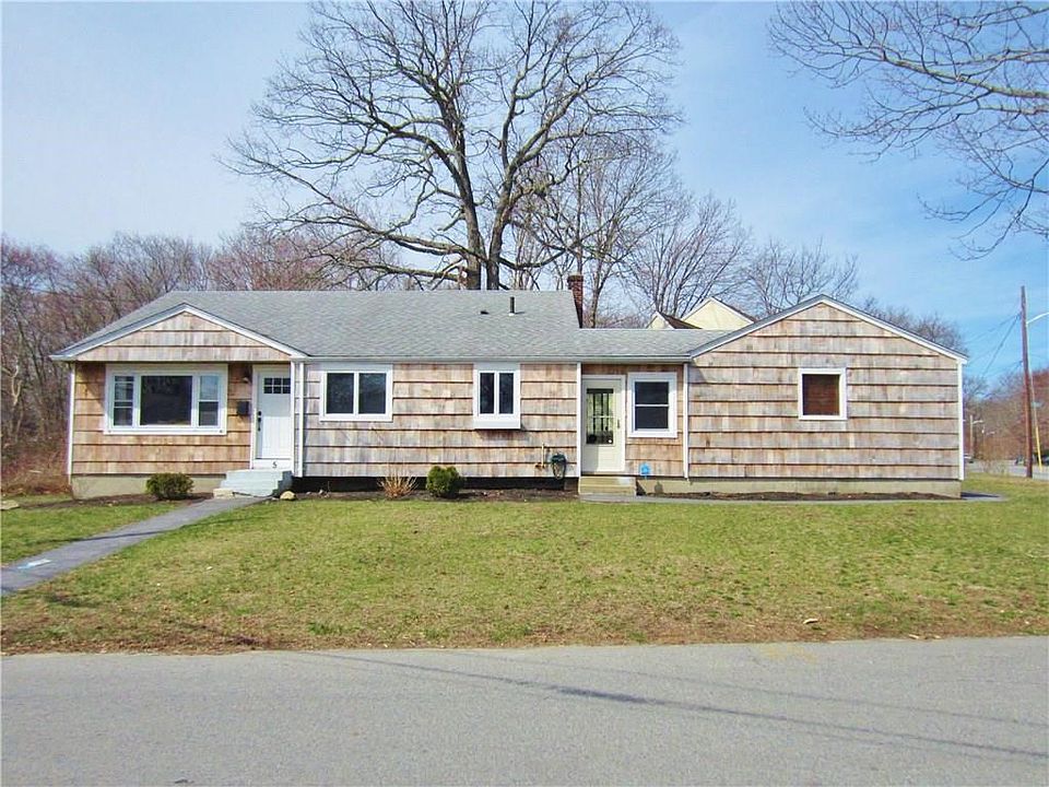 Very Deceiving 3- 4 Bed Tri-Level Home Nestled on a Corner Lot in a Wonderful Neighborhood!