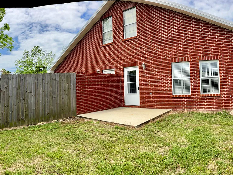 Fenced back yard and private patio
