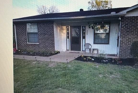 Front of house with front walk access as well!