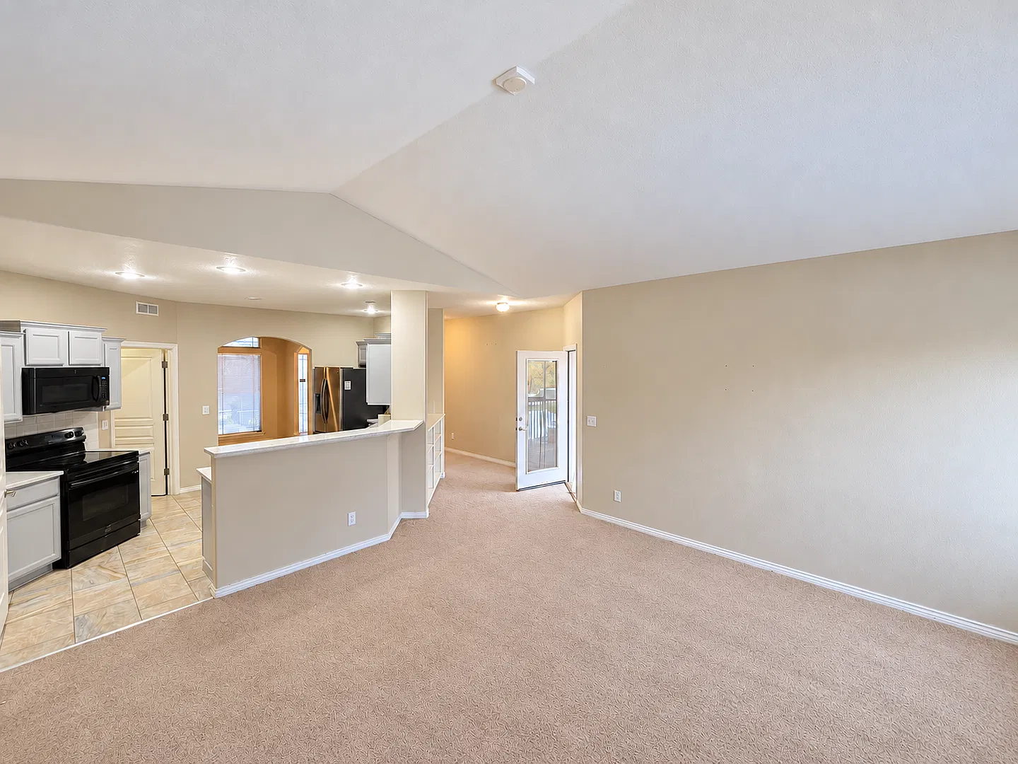 Parkside Living with a Vaulted Great Room & Covered Deck — Photo 4