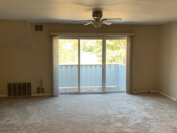 Family room with sliding door to balcony
