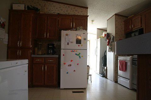 View of kitchen going into laundry rm.