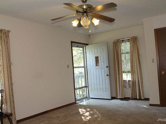 Spacious LR with cieling fan light fixture!