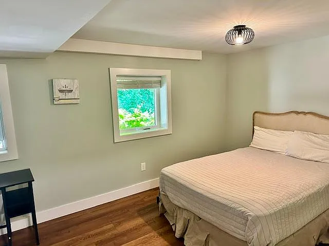 Bedroom #4: Large bedroom downstairs with room for office space and large closet.