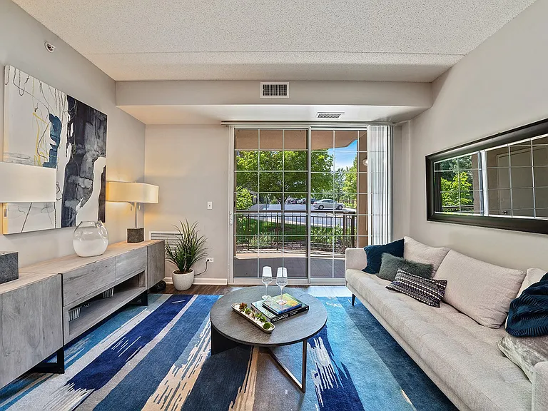 Living room with patio access and natural light