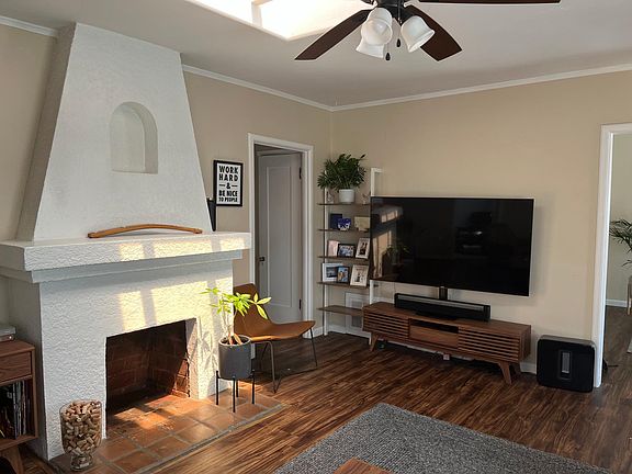 Family Room. Bright, sunny and airy. Decorative fireplace. Skylight.