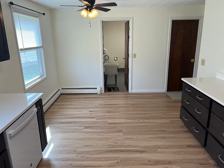 Eat In Protion Of Kitchen - View INto Laundry Room