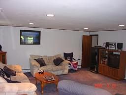 Large family room with fireplace and full bath