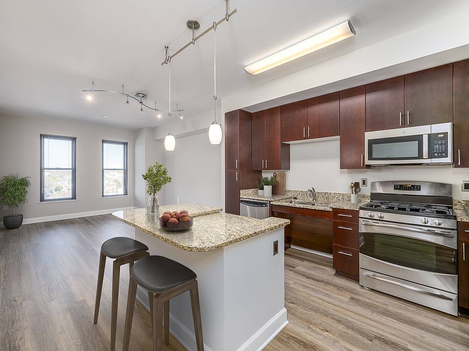 Kitchen with LTV flooring (virtually staged)