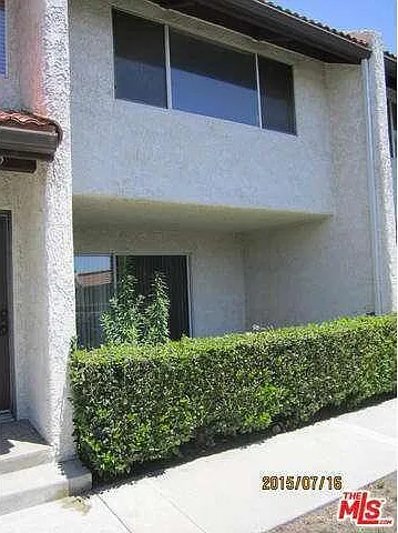 Bedroom Window (above) and patio outside living room
