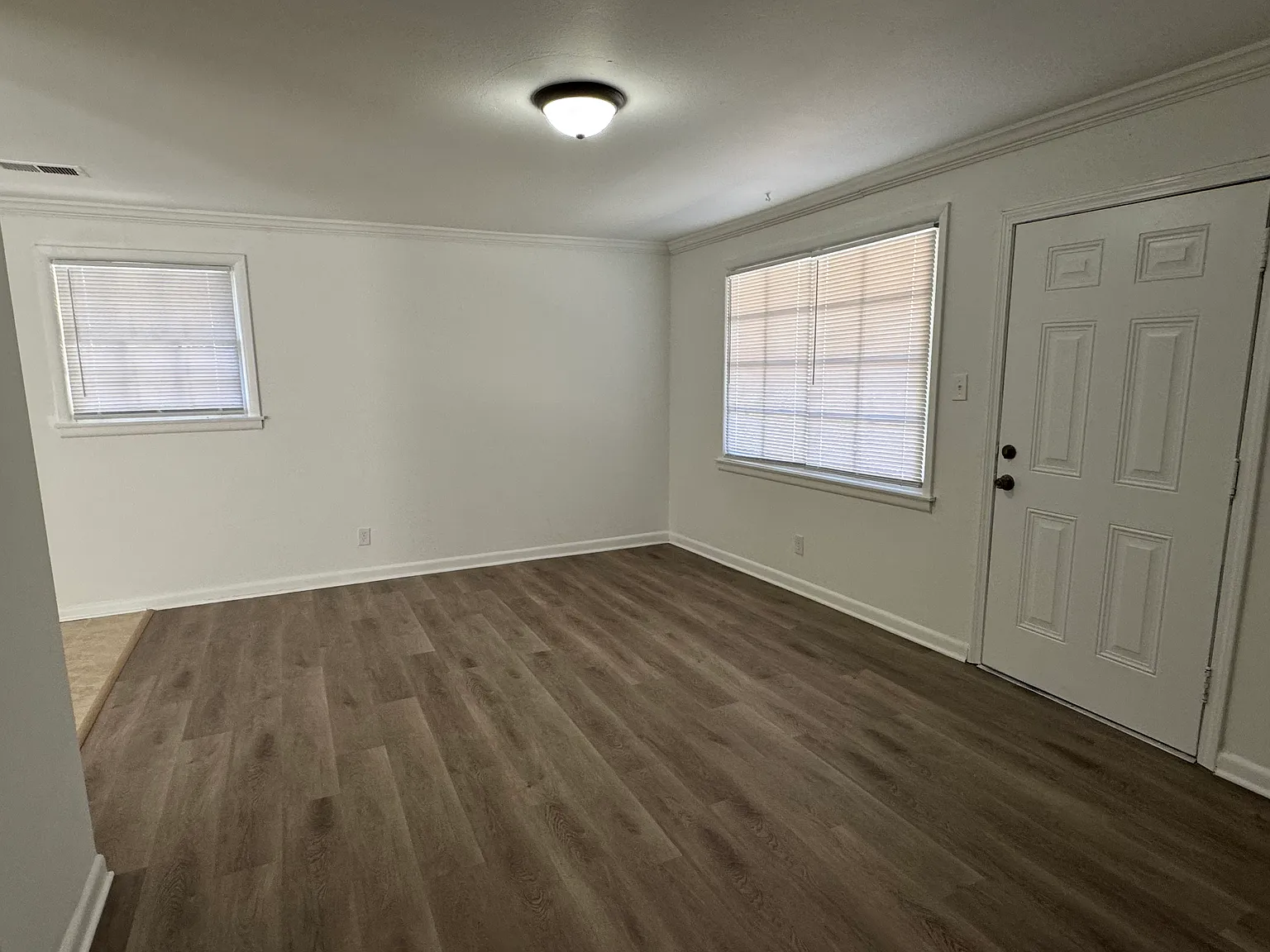 Bright and Inviting 3-Bedroom Brick Home with Fenced Backyard — Photo 4