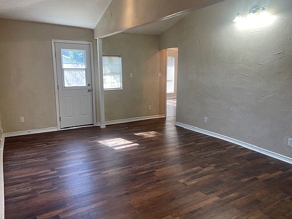 Spacious Living Room with vaulted ceiling